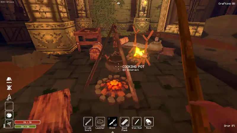 Cooking pot over a campfire at camp
